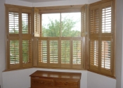 bay-window-wooden-shutters