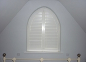 arched-white-shutters