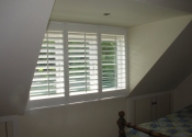 white-shutters-in-dormer-window